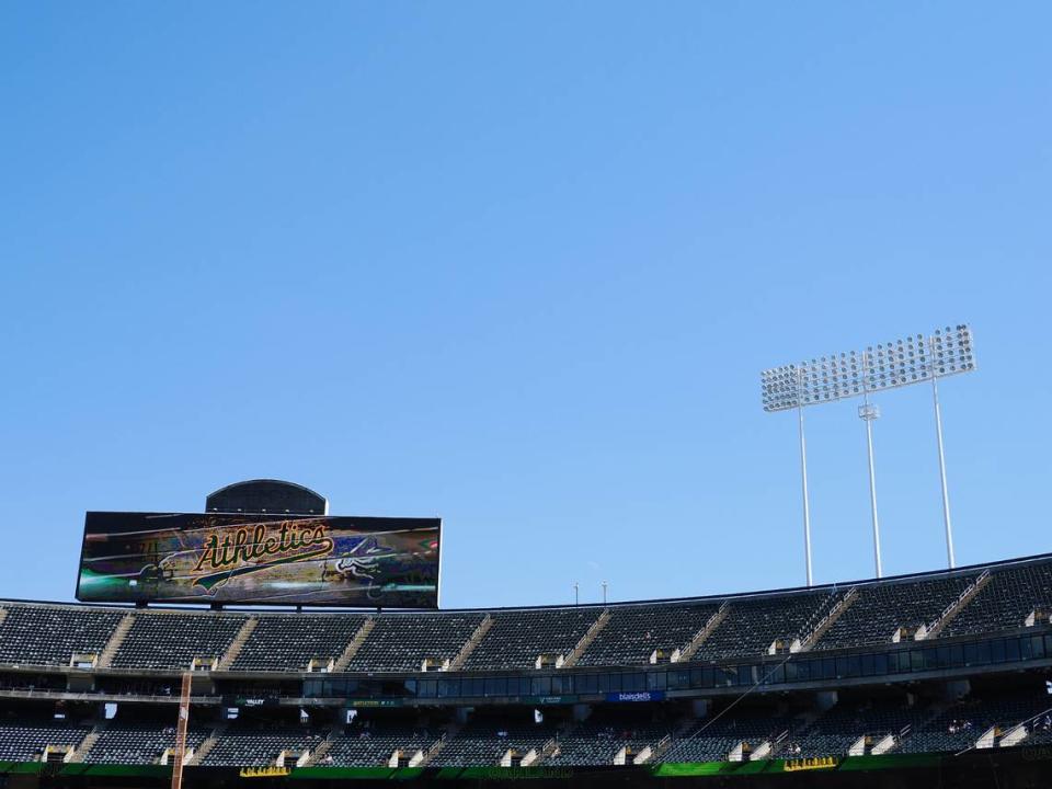 The mostly empty second and third level bleachers during the eighth inning between the Oakland Athletics and Kansas City Royals at Oakland-Alameda County Coliseum.