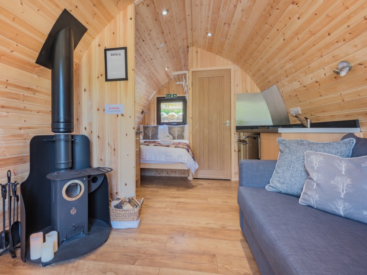 The pods feature wood-burning stoves, shower rooms and terraces (The Yan)