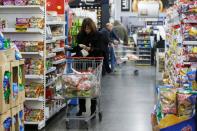 Customers shop inside a supermarket in Beirut