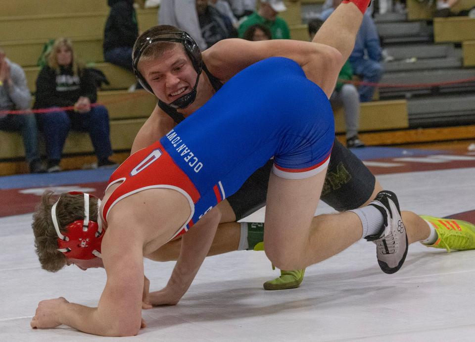 Brick Memorial's Ben Szuba is shown during the District 22 215-pound final against Ocean's Daniel Farina.