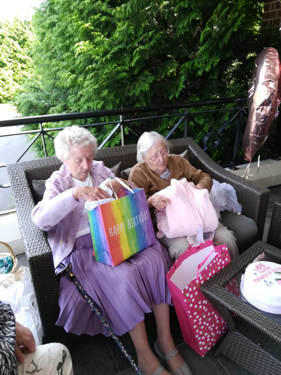 The twins celebrating their 101st birthday last year. (Fred Dumbleton/SWNS)