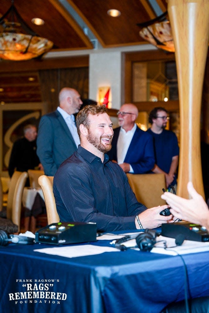 Detroit Lions center Frank Ragnow talks with fans during his personal charity's "Dine With The Pride" event at Eddie Merlot's in Bloomfield Hills in 2022.