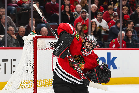 CHICAGO, IL - DECEMBER 01: Goalie Corey Crawford #50 of the Chicago Blackhawks watches the puck in the first period against the New Jersey Devils at the United Center on December 1, 2016 in Chicago, Illinois. (Photo by Chase Agnello-Dean/NHLI via Getty Images)