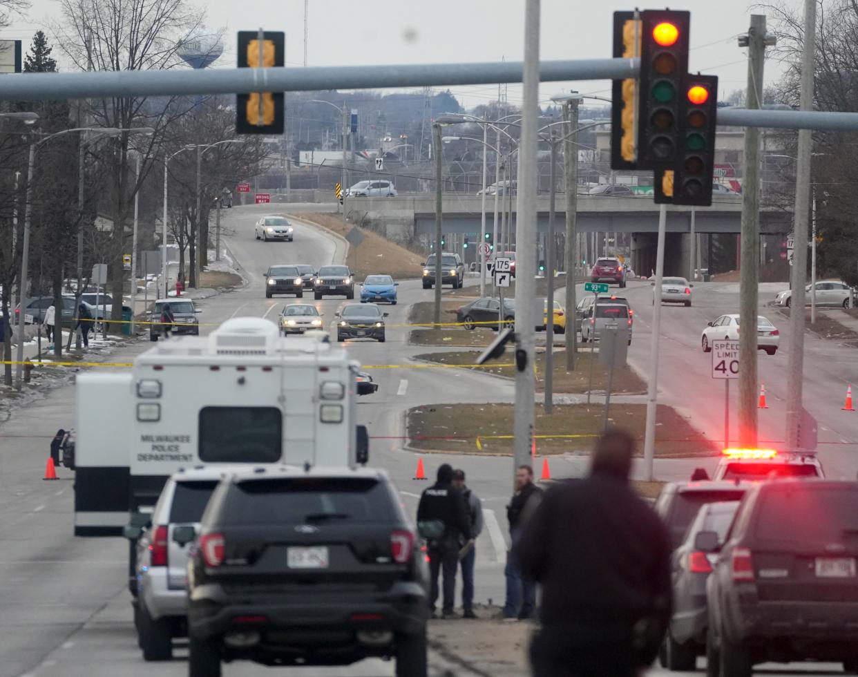 Streets are blocked off Tuesday near North 91st Street and West Silver Spring Drive following a vehicle pursuit where the suspect crashed into an uninvolved vehicle and fled the scene on foot and was later shot by an officer in Milwaukee.