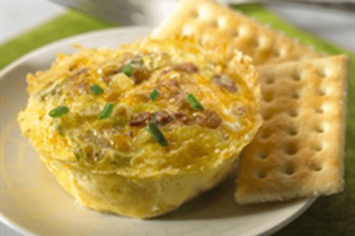 <p>You can have a savory and satisfying breakfast without expending tons of effort. These flavorful mini quiches are loaded with favorite breakfast fixings like Cheddar cheese and crispy crumbled bacon. They’re so easy to make, you won’t even need a cup of coffee to get through the process.<br><br><a href="http://www.thedailymeal.com/recipes/keebler-club-quiches-recipe" rel="nofollow noopener" target="_blank" data-ylk="slk:For the Keebler Club Quiches recipe, click here.;elm:context_link;itc:0;sec:content-canvas" class="link "><b>For the Keebler Club Quiches recipe, click here.</b></a></p>