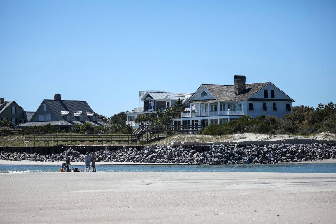 From the Southernmost tip of Pawley’s Island fisherman fish in the inlet between Pawley’s and Debordieu Plantation. The rock barriers protecting the coastline remain. Wednesday, Oct. 6, 2022. JASON LEE