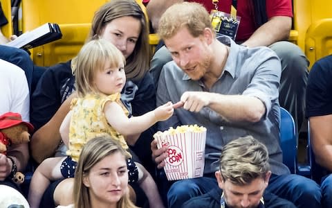 Prince Harry points out the cameras - Credit: Danny Lawson/PA