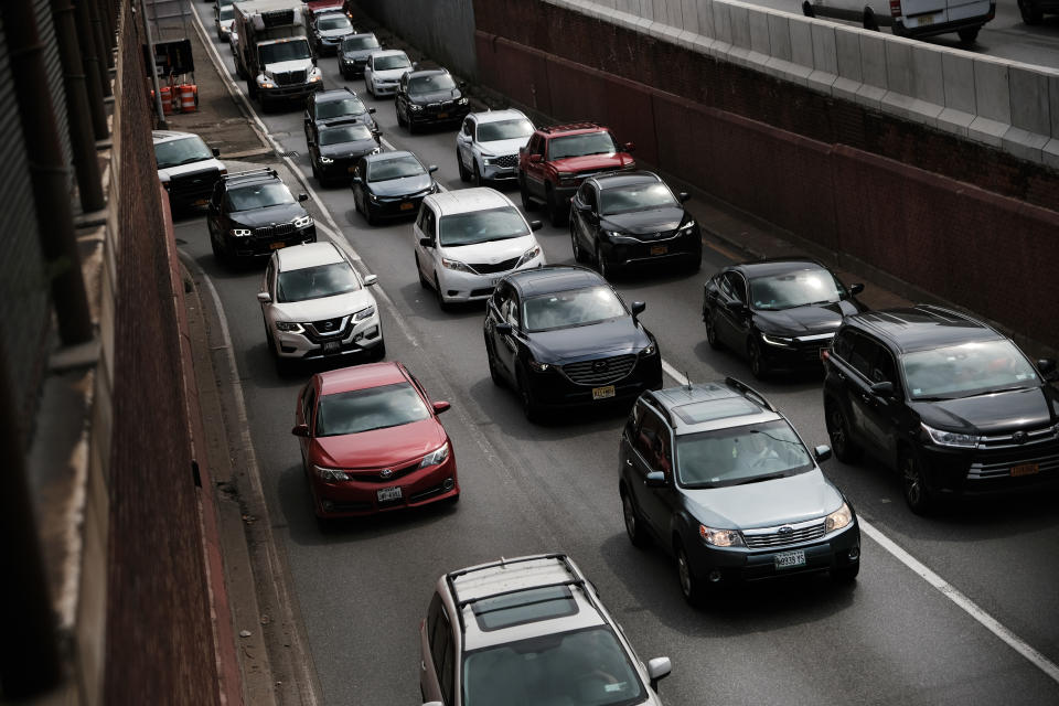 Three lanes of bumper-to-bumper traffic crawls through Brooklyn. (Spencer Platt/Getty Images)
