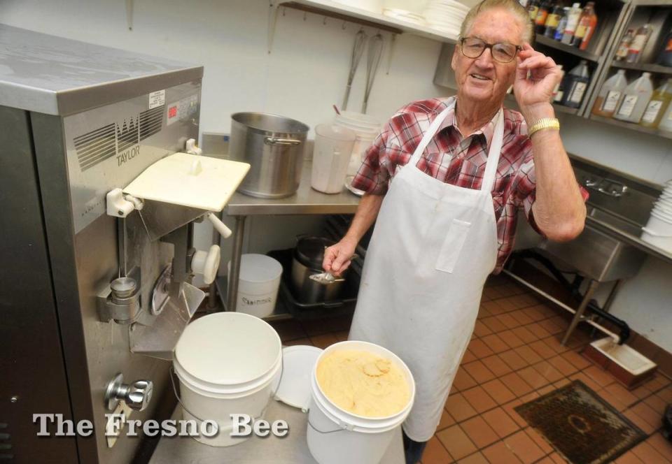 88-year-old Chic Brooks churns out his pumpkin pie ice cream at his Jeb’s Creamery in Kingsburg in this file photo from 2014.