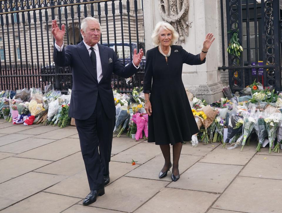 King Charles III and Camilla, Queen Consort view tributes on Sept. 9, 2022, in London left outside Buckingham Palace, London, following the death of Queen Elizabeth II on Sept. 8, 2022, in Balmoral, Scotland.