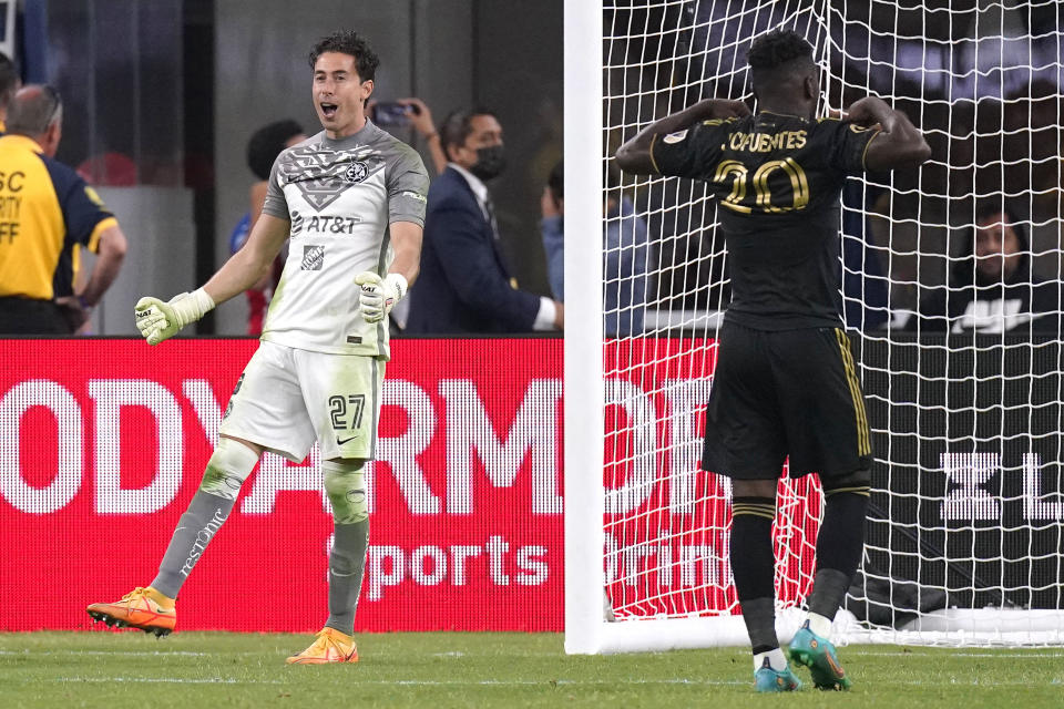 Club America goalkeeper Oscar Jimenez, left, celebrates after Los Angeles FC midfielder Jose Cifuentes kicked over the goal in a shootout to give the win to Club America during a Leagues Cup soccer match Wednesday, Aug. 3, 2022, in Inglewood, Calif. Club America won 1-0. (AP Photo/Mark J. Terrill)
