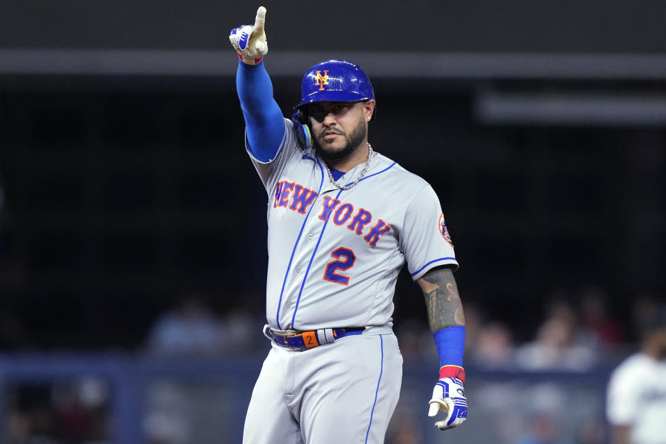 New York Mets' Omar Narvaez gesturwes after hitting a double against the Miami Marlins during the fourth inning of a baseball game Wednesday, Sept. 20, 2023, in Miami. (AP Photo/Lynne Sladky)