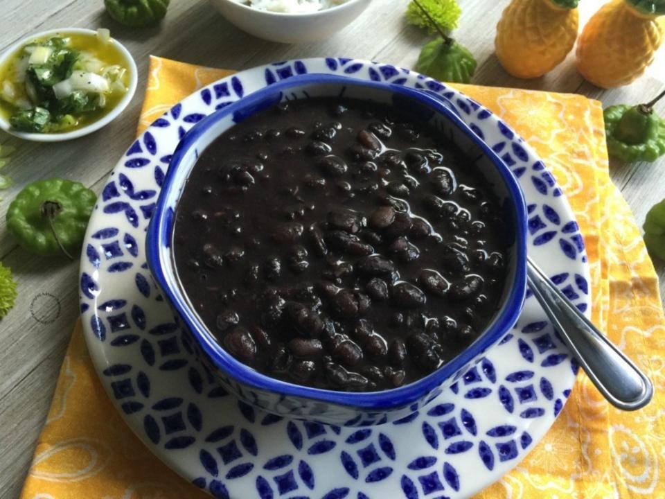<p>Adriana's Best Recipes</p><p>Missing Cuban food? These Cuban black beans conveniently prepared in the pressure cooker are easy to make and full of <em>sabor.</em> Pair with rice and your favorite protein and experience a party in your mouth!</p><p><strong>Get the Recipe: <a href="https://www.adrianasbestrecipes.com/cuban-black-beans/" rel="nofollow noopener" target="_blank" data-ylk="slk:Cuban Black Beans;elm:context_link;itc:0;sec:content-canvas" class="link ">Cuban Black Beans </a></strong></p>