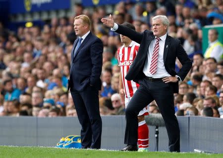 Football Soccer Britain - Everton v Stoke City - Premier League - Goodison Park - 27/8/16 Stoke City manager Mark Hughes and Everton manager Ronald Koeman Action Images via Reuters / Ed Sykes Livepic