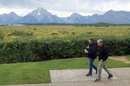 FILE PHOTO: Federal Reserve Chair Jerome Powell and New York Federal Reserve President John Williams walk together in Jackson Hole