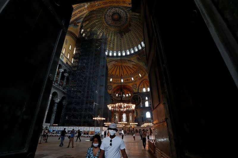 People visit the Hagia Sophia or Ayasofya, a UNESCO World Heritage Site, which was a Byzantine cathedral before being converted into a mosque and currently a museum, in Istanbul