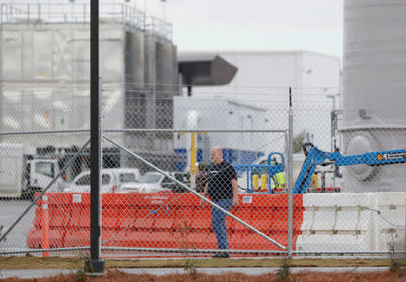 A worker walks through the Boeing South Carolina Plant while voting started Wednesday whether the plant will be unionized in North Charleston, South Carolina, U.S. February 15, 2017. REUTERS/Randall Hill