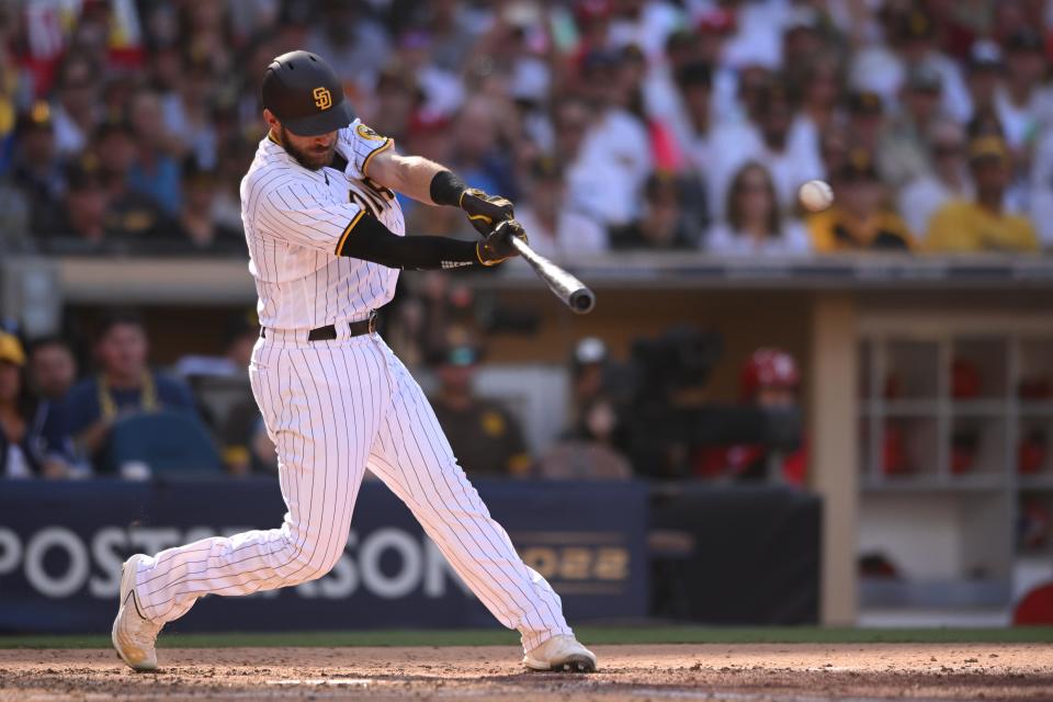 Padres catcher Austin Nola hits an RBI-single in the fifth inning off his brother Aaron.