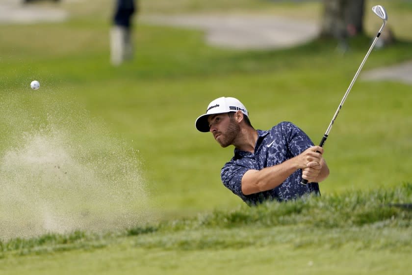 Matthew Wolff plays a shot from a bunker on the ninth hole during the third round.