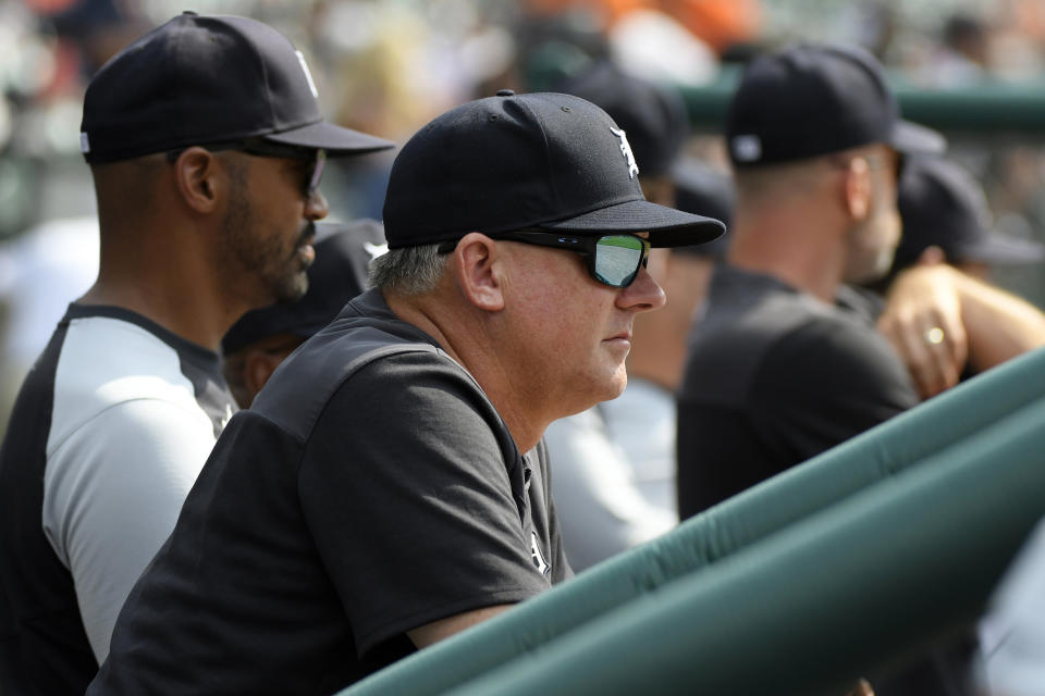 Detroit Tigers manager A.J. Hinch, front, watches his team play against the Chicago White Sox in the first inning of a baseball game, Sunday, Sept. 18, 2022, in Detroit. (AP Photo/Jose Juarez)