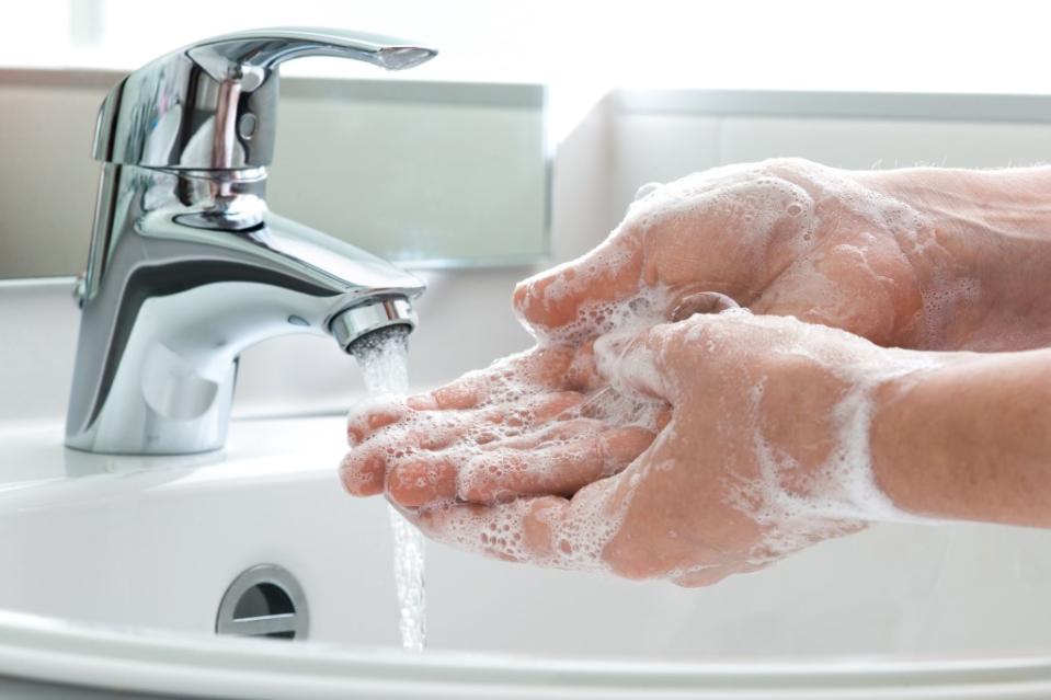 You don’t need to wash the backs of your hands every time you’re at the sink, Turegano advises. Getty Images/iStockphoto