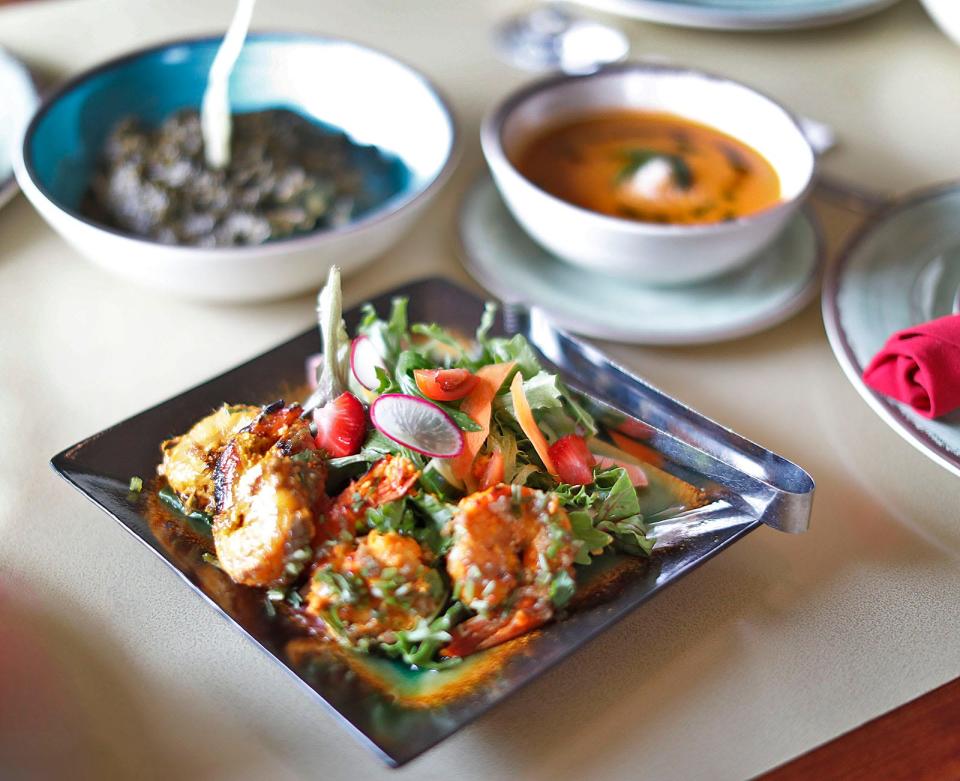 Saag with button mushrooms and spinach at Turmeric House on Washington Street in Weymouth on Tuesday, June 27, 2023.