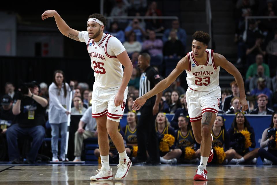 ALBANY, NEW YORK - MARCH 17: Race Thompson #25 and Trayce Jackson-Davis #23 of the Indiana Hoosiers react in the first half against the Kent State Golden Flashes during the first round of the NCAA Men's Basketball Tournament at MVP Arena on March 17, 2023 in Albany, New York.