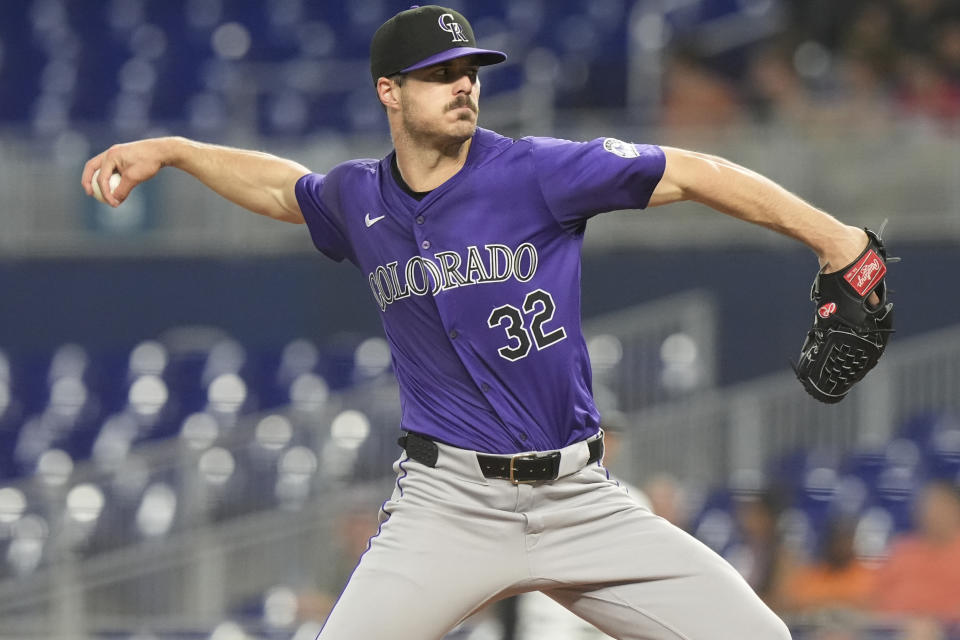 Colorado Rockies starting pitcher Dakota Hudson (32) aims a pitch during the second inning of a baseball game against the Miami Marlins, Wednesday, May 1, 2024, in Miami. (AP Photo/Marta Lavandier)