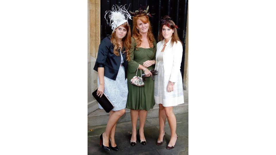 Sarah Ferguson and her two daughters Princess Beatrice and Princess Eugenie in wedding guest dresses