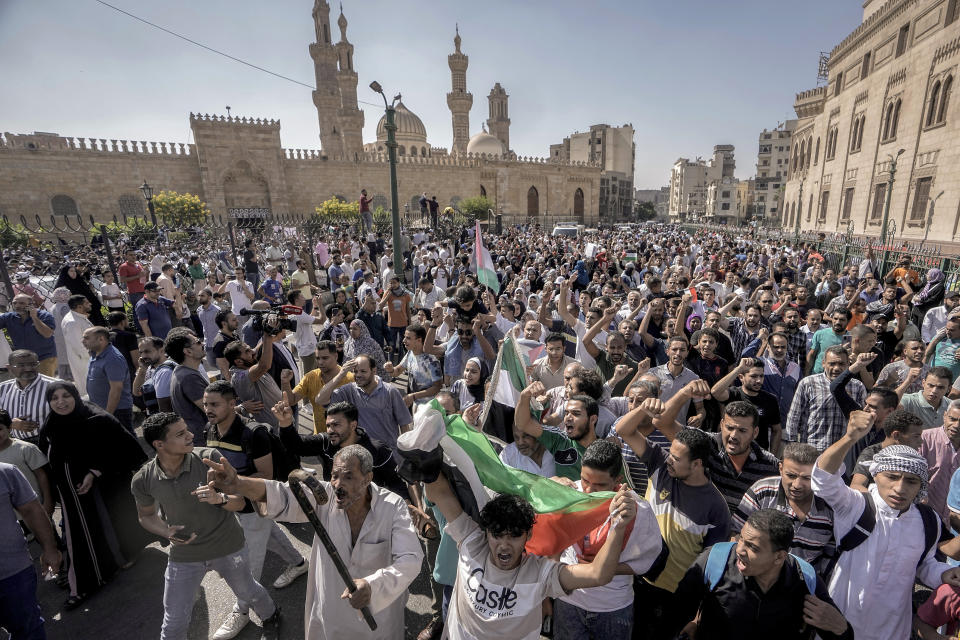 FILE - Protesters shout anti-Israel slogans during a rally to show solidarity with the people of Gaza after Friday prayers at Azhar mosque, the Sunni Muslim world's premier Islamic institution, in Cairo, Egypt, Friday, Oct. 20, 2023. Countries in the Middle East that have normalized or are considering normalizing relations with Israel are coming under growing public pressure to cut those ties because of Israel's war with Hamas. The protesters' demands present an uncomfortable dilemma for governments that have enjoyed the benefits of closer military and economic ties with Israel in recent years. (AP Photo/Amr Nabil, File)