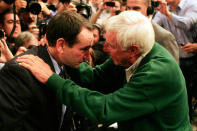 NEW YORK, NY - NOVEMBER 15: Head coach Mike Krzyzewski of the Duke Blue Devils hugs Bob Knight after winning his 903rd game and passing him to become the all-time winningest coach in Men's Division 1 Basketball during the 2011 State Farm Champions Classic at Madison Square Garden on November 15, 2011 in New York City. (Photo by Patrick McDermott/Getty Images)