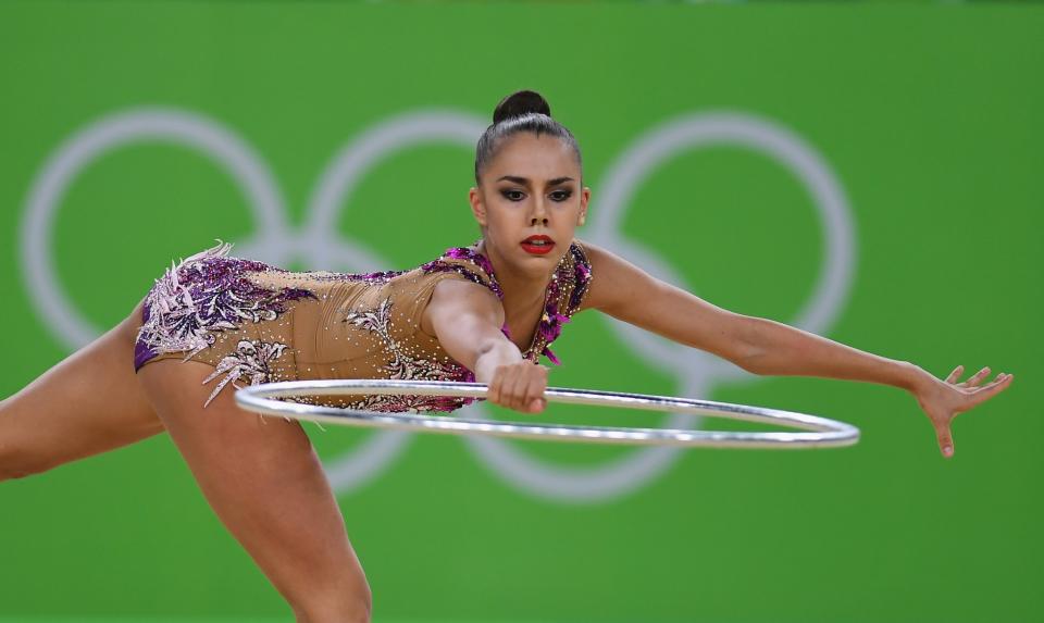<p>Margarita Mamun of Russia competes during the Rhythmic Gymnastics Individual All-Around on August 19, 2016 at Rio Olympic Arena in Rio de Janeiro, Brazil. (Getty) </p>