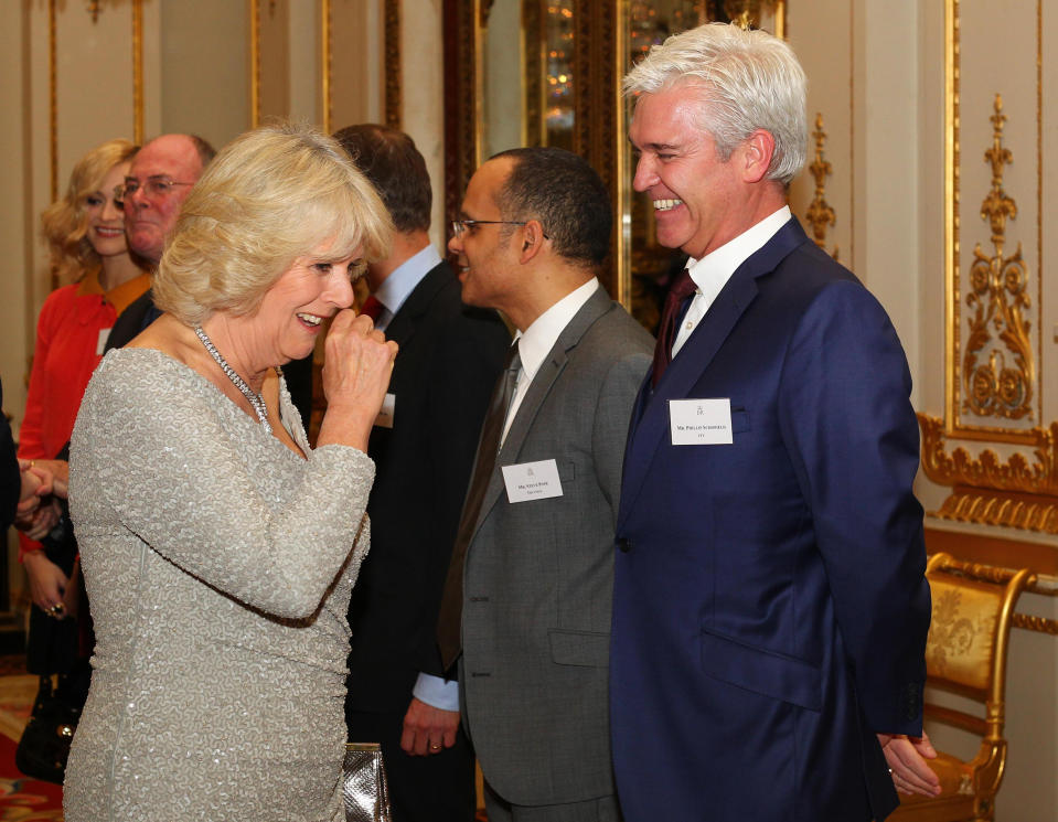 The Duchess of Cornwall meets Phillip Schofield during a reception for members of the media at Buckingham Palace, London.