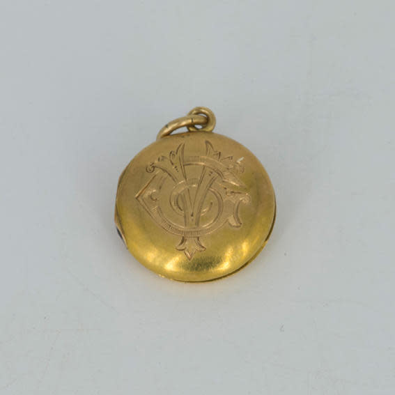 A locket found on the ocean floor belongs to Virginia Clark, who boarded the Titanic in 1912. / Credit: Premier Exhibitions, Inc.