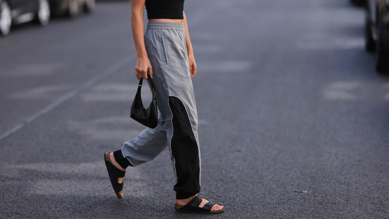 a person walking in the street travel shoes