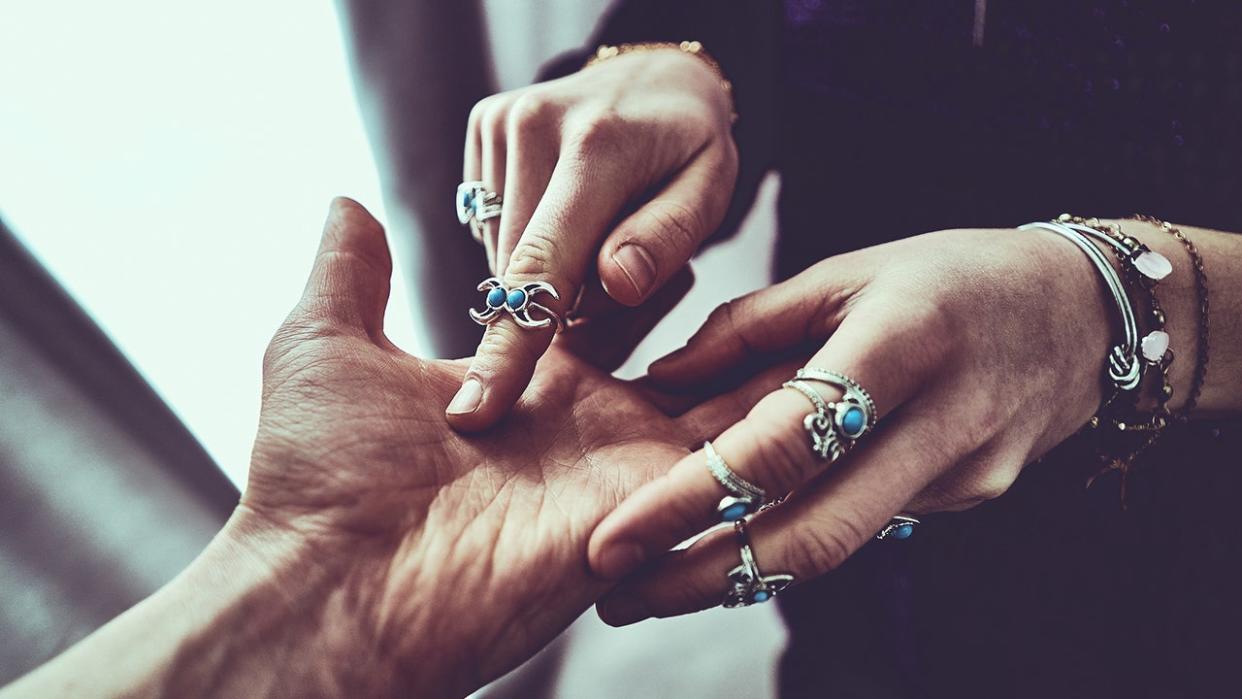 person getting palm read