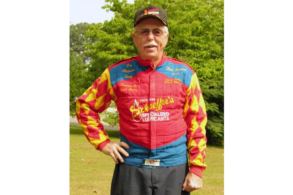 FILE - Red Farmer stands in his backyard, Thursday July 6, 2006, in Hueytown, Ala. Farmer will be inducted into the NASCAR Hall of Fame during ceremonies in Charlotte, N.C., Friday, Jan. 21, 2022. (Mike Bolton/The Birmingham News via AP, File)