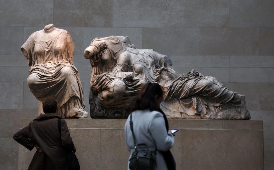 Visitors look at the Elgin marbles, also known as the Parthenon marbles, at the British Museum (EPA)