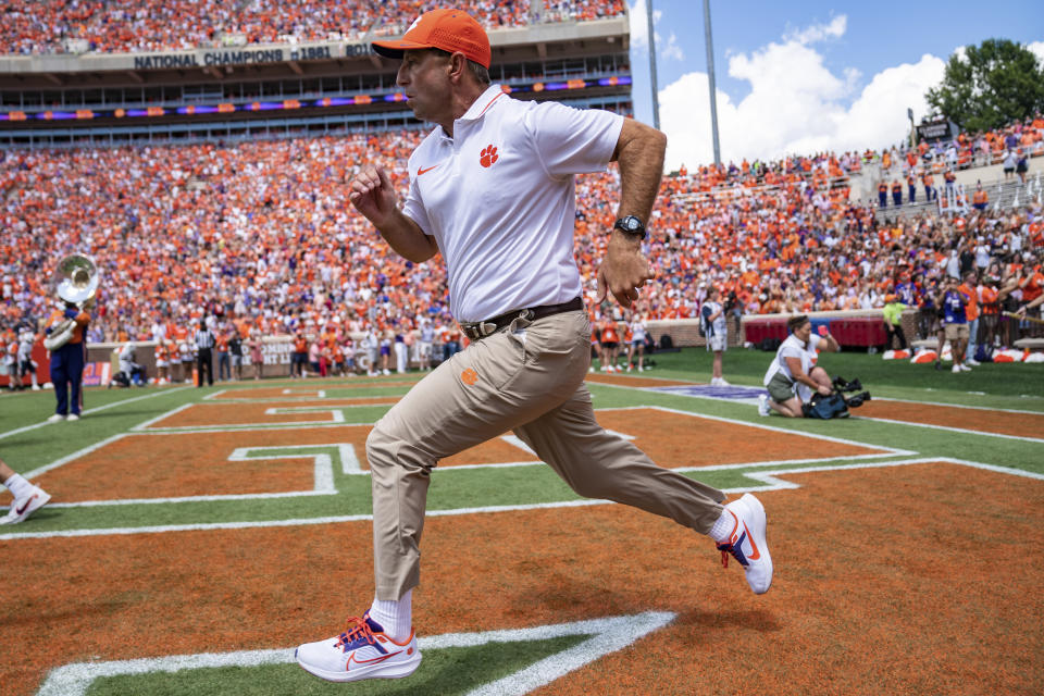 Dabo Swinney and the Tigers are running to keep ahead of obsolescence. (AP Photo/Jacob Kupferman)