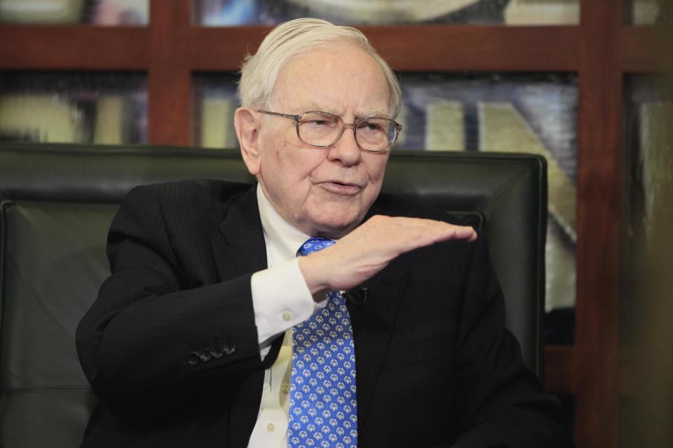 FILE - In this May 6, 2013 file photo, Warren Buffett, Chairman, President & CEO of Berkshire Hathaway, gestures during an interview with Liz Claman of the Fox Business Network, in Omaha, Neb. Berkshire Hathaway reports quarterly earnings on Friday, May 2, 2014. (AP Photo/Nati Harnik, File)