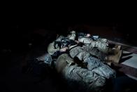 <p>Members of the National Guard rest in the Capitol Visitors Center on Capitol Hill in Washington, DC, January 13, 2021</p>