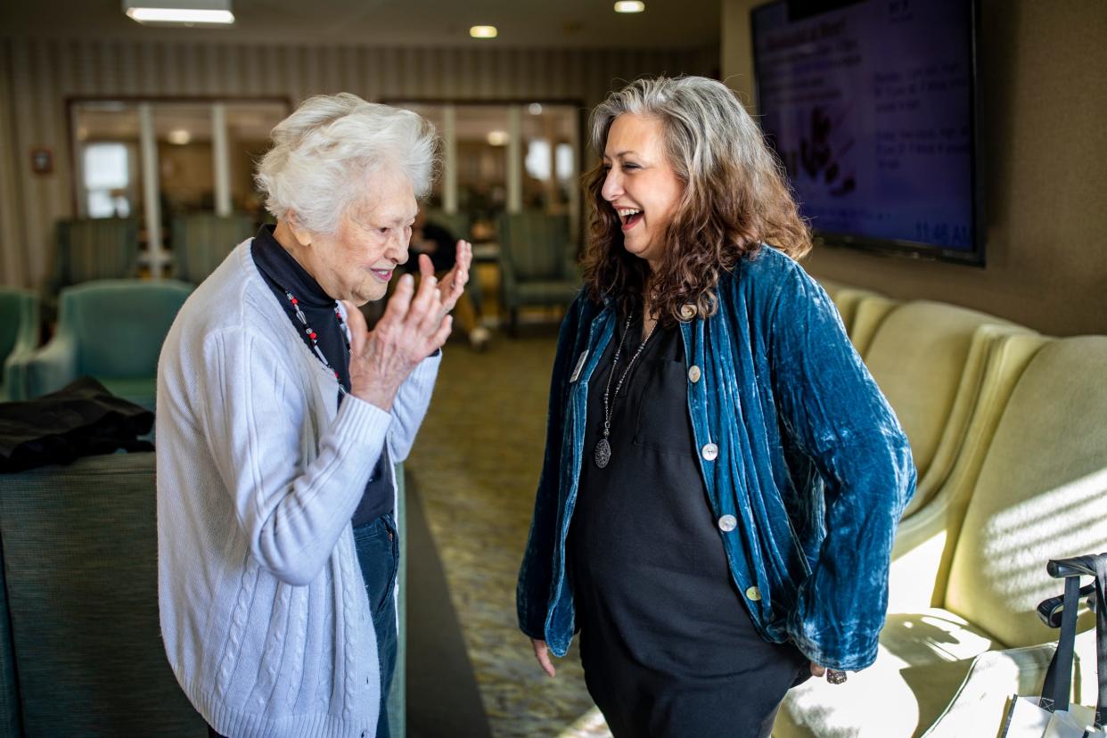 Edith Blumer, 98, left, is with Beth Robinson, 59, of West Bloomfield, at Norma Jean and Edward Meer Independent Living Apartments in West Bloomfield where Blumer is a resident and is taking a writing class facilitated by Friends of Jewish Senior Life. Robinson is the director of Friends of Jewish Senior Life and collected the stories of 39 residents, including Blumer, in a book called “Don’t Write Me Off!” Blumer says she had only written letters before taking the class and attributes her great memory to being able to write great stories on Thursday, Nov. 9, 2023.