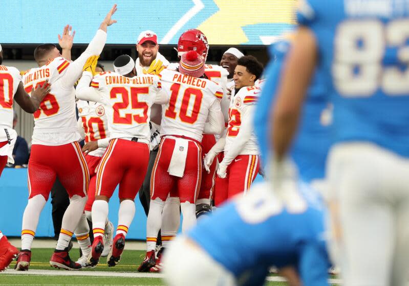 The Chargers celebrate on the Chargers' home turf.