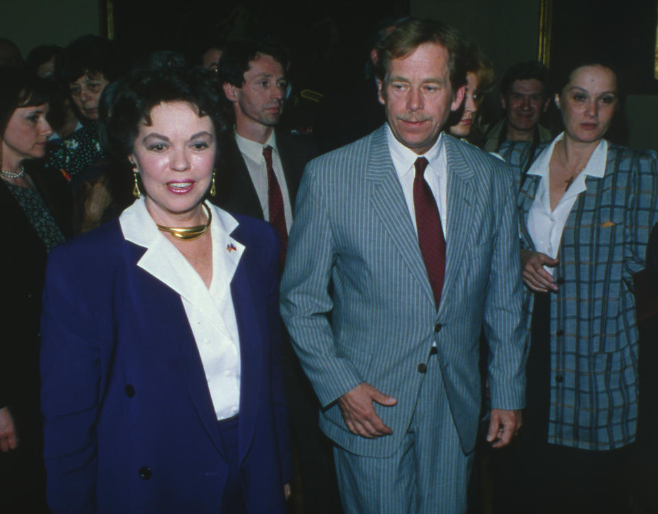 In this Sunday, May 6, 1990, file photo, U.S. Ambassador to Czechoslovakia Shirley Temple Black, left, and Czechoslovakian President Vaclav Havel take part in the celebration of the 45th anniversary of the Liberation of Pilsen at Pilsen Town Hall, Czechoslovakia. Temple, who died at her home near San Francisco, Monday, Feb. 10, 2014, at 85, sang, danced, sobbed and grinned her way into the hearts of Depression-era moviegoers and remains the ultimate child star decades later. (AP Photo/Antonin Novy, File)