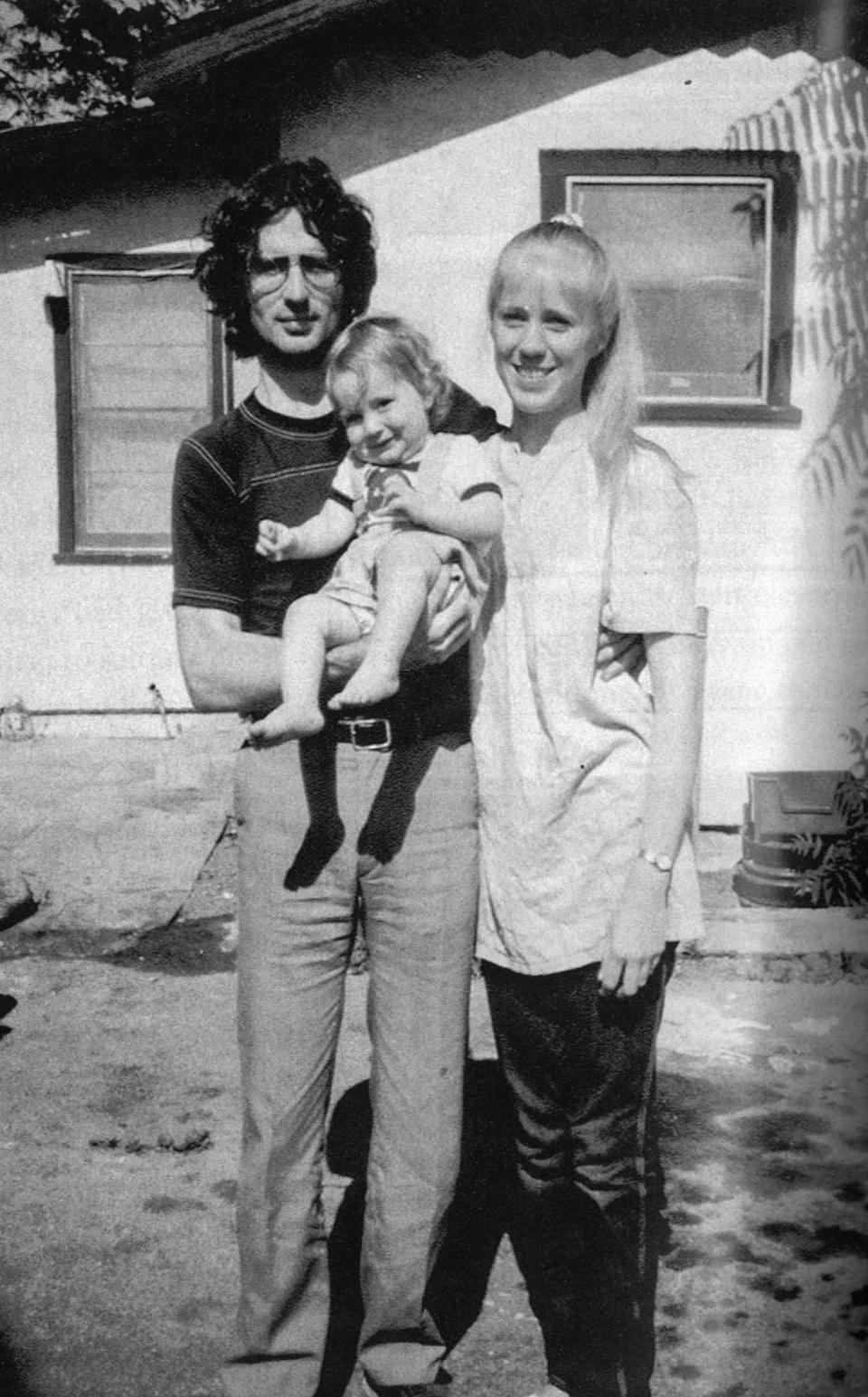 David Koresh with his legal wife, Heather, and their son, Cyrus.