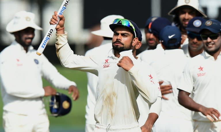 Indian captain Virat Kohli (centre) celebrates his side's Test series victory against Sri Lanka in Colombo on September 1, 2015