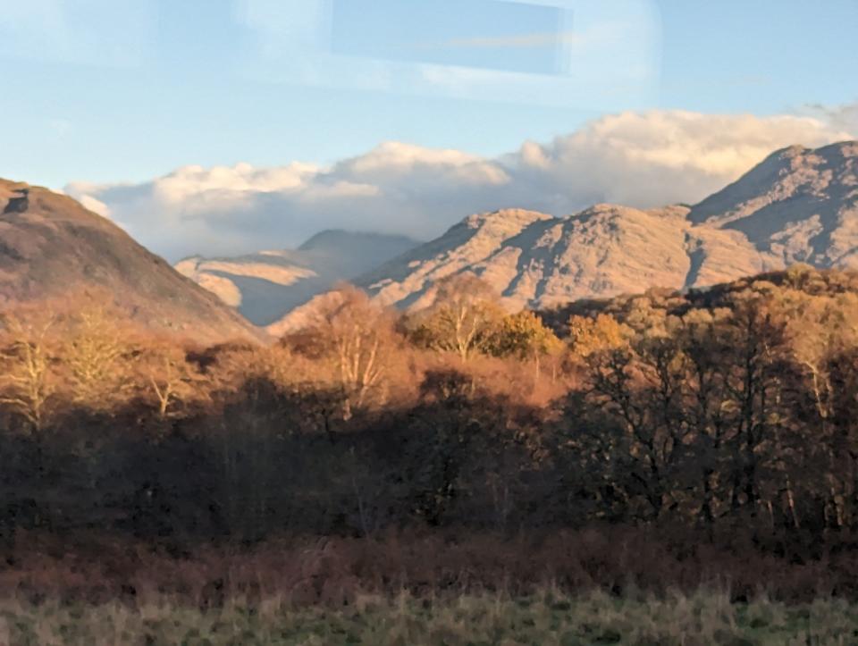 The Falls of Cruachan sit at the foot of Ben Cruachan Mountain, view from train window