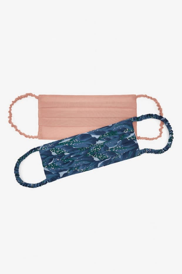 <p>The Fold London Florence Non-Medical Face Masks (2-Pack), $40, <a href="https://thefoldlondon.com/product/florence-non-surgical-face-masks-blue-feather-print-silk-pink-silk/" rel="nofollow noopener" target="_blank" data-ylk="slk:available here;elm:context_link;itc:0;sec:content-canvas" class="link ">available here</a>. (Features 100% cotton lining, filter pocket; £15 from every set sold will go directly to <a href="https://smartworks.org.uk/" rel="nofollow noopener" target="_blank" data-ylk="slk:Smart Works charity;elm:context_link;itc:0;sec:content-canvas" class="link ">Smart Works charity</a>.)</p>