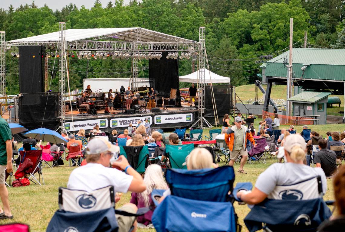 The crowd starts to fill in as Obvious Pocket plays at WingFest at Tussey Mountain on Thursday, Aug. 4, 2022.