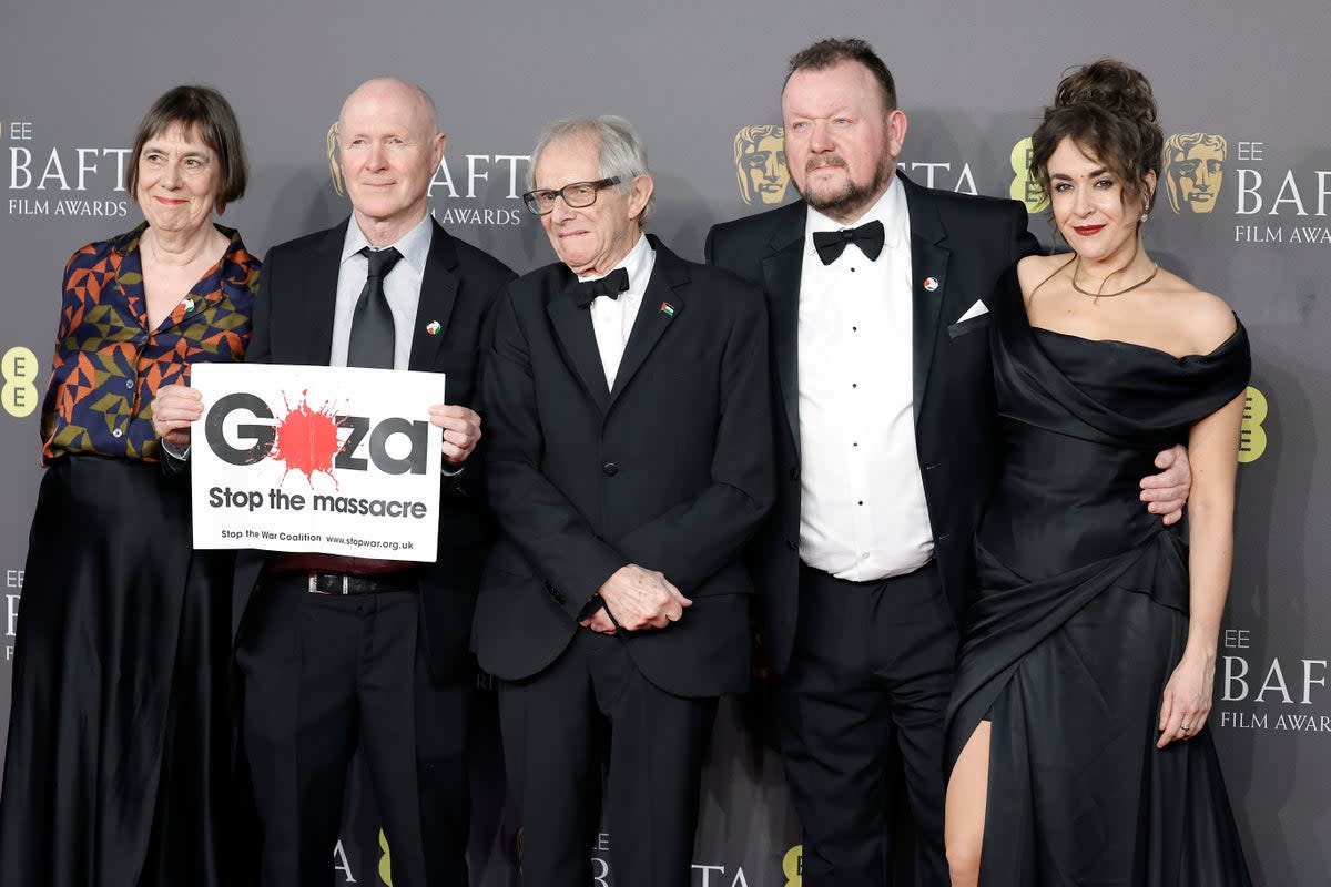 Rebecca O’Brien, Paul Laverty, Ken Loach and guests attend the 2024 BAFTAs (Getty Images)